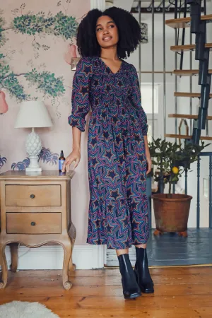 Amberly Midi Shirred Dress - Black. Rainbow Star Explosion