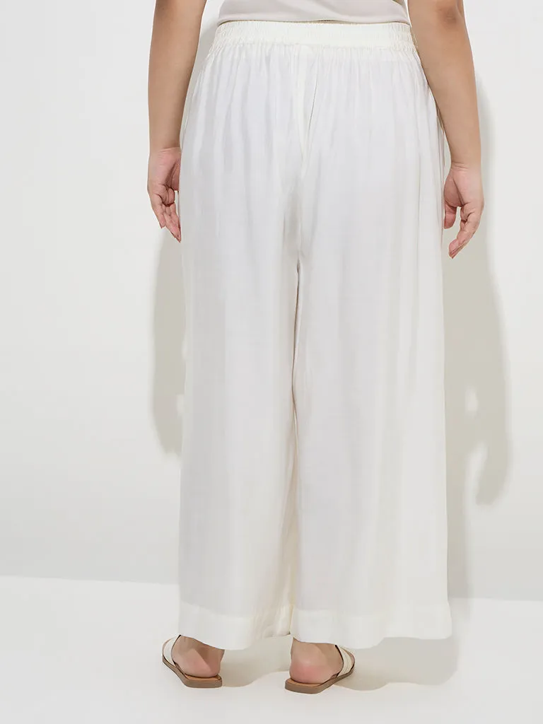 Diza Off-White Solid Palazzos