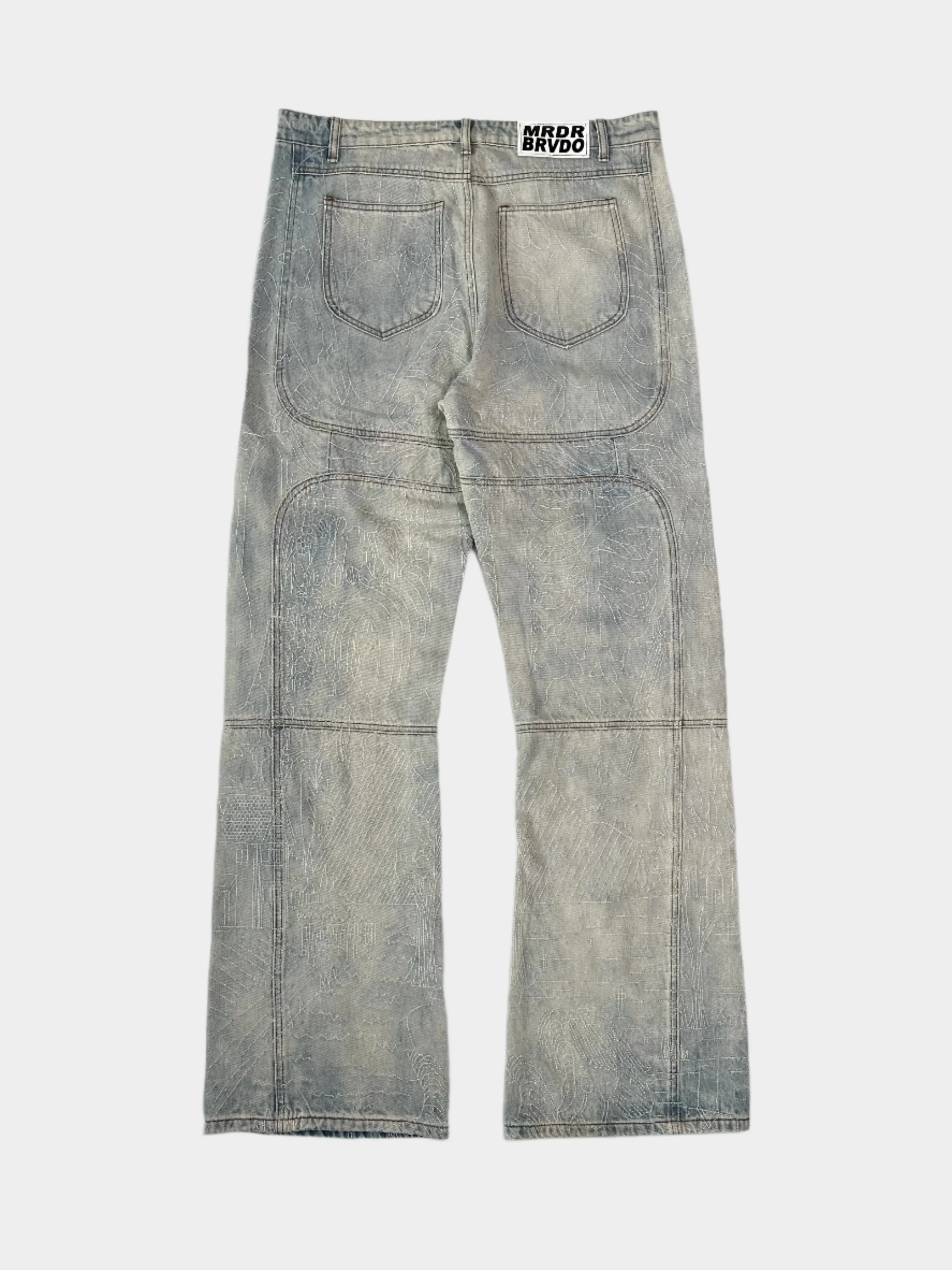 Jeans In Denim Chiaro Con Effetto Graffiato
