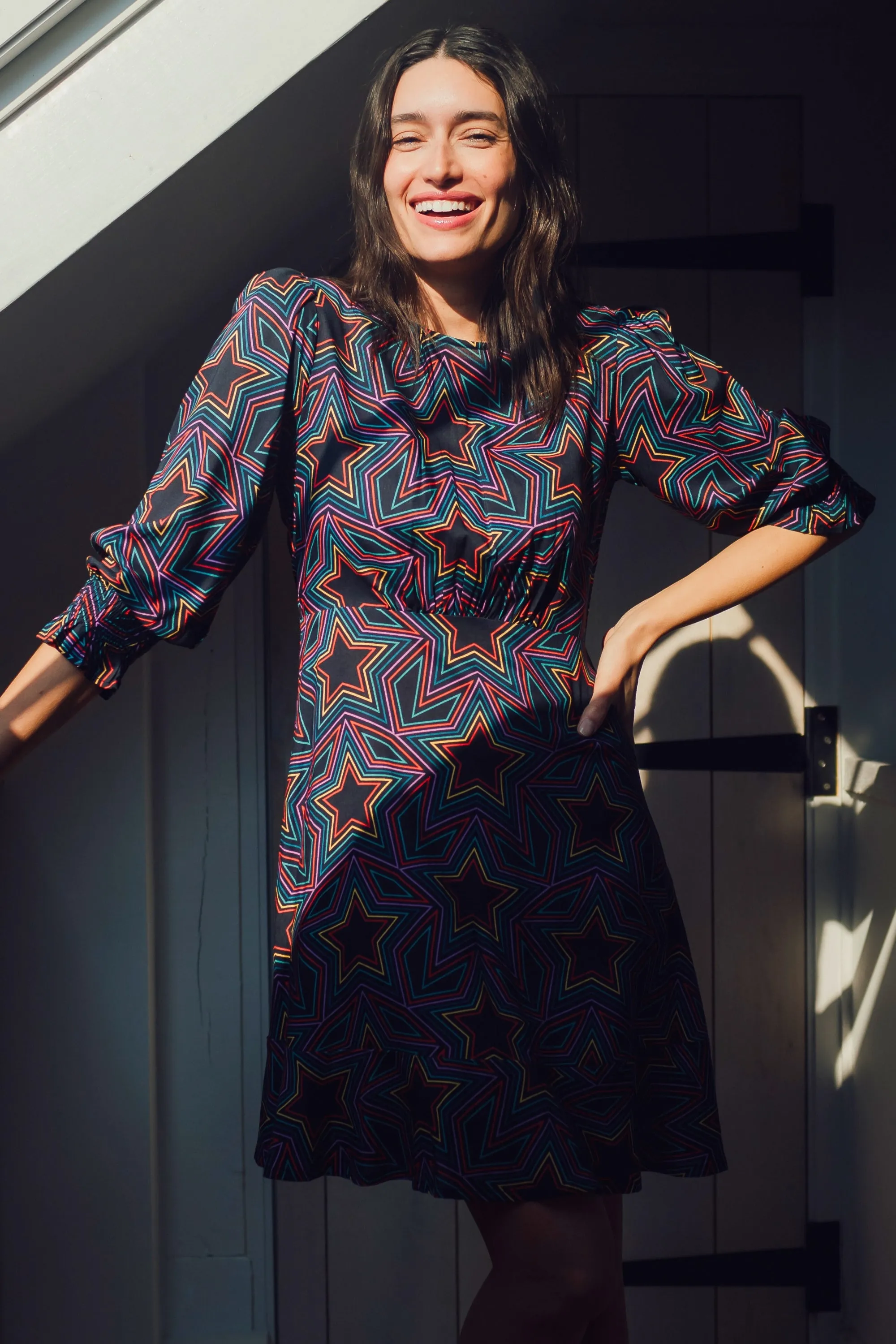 Lorelei Mini Dress - Black. Rainbow Star Explosion